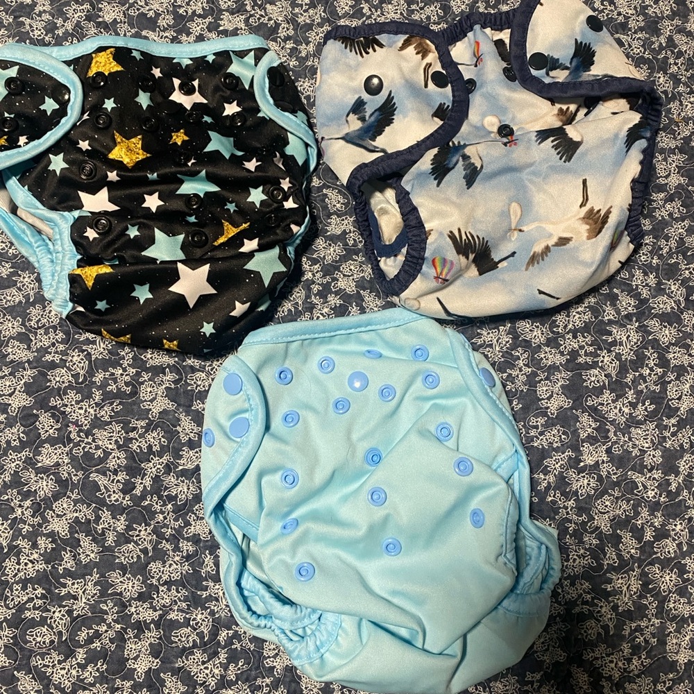 Thirsties and osocozy cloth diaper shell cover